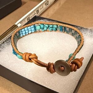 Handcrafted Beaded Bracelet with Turquoise and Brown Leather Accents